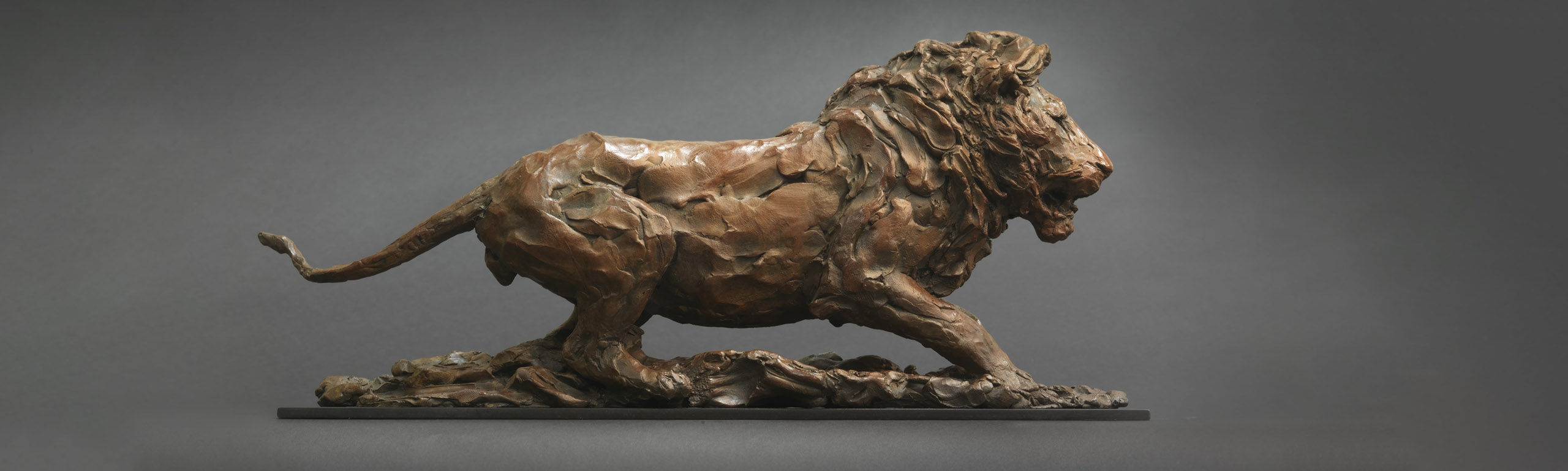 Lion About To Spring Bronze Sculpture